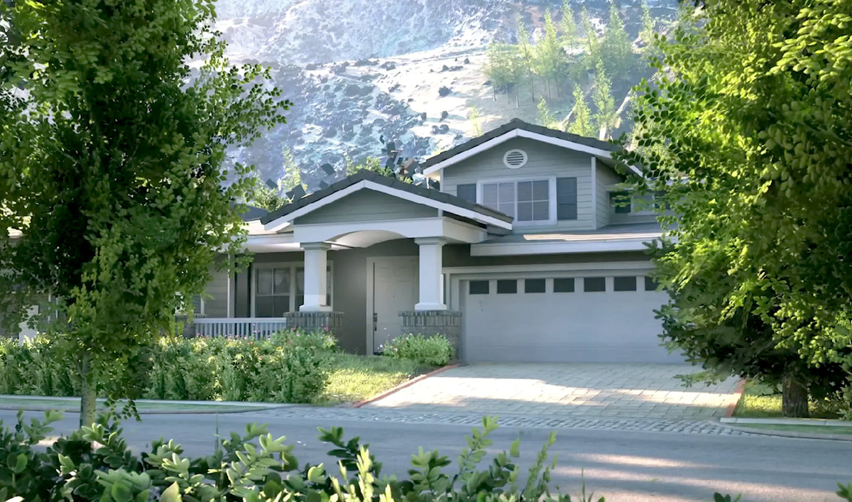 House with hill in the background and surrounded by trees