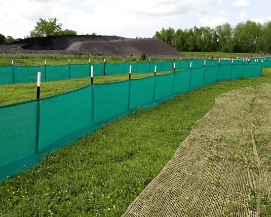 Green evoguard pro 3x100 weather barriers setup in a field